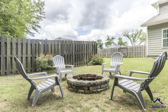 501 Adirondac Way, Bonaire, GA 31005 - fenced backyard featuring a fire pit