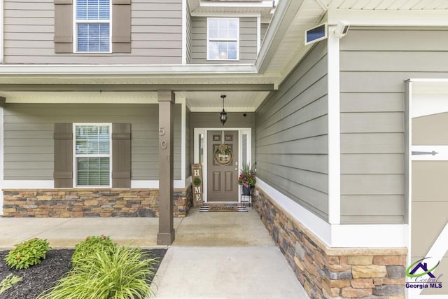 501 Adirondac Way, Bonaire, GA 31005 - property entrance featuring stone siding and covered porch