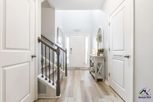 501 Adirondac Way, Bonaire, GA 31005 - foyer entrance with light wood-style floors and stairs