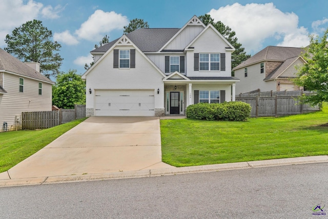 104 Taylor Leigh Ct, Kathleen, GA 31047 - craftsman house with board and batten siding, a garage, and driveway