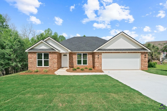 219 Christine Cir, Perry, GA 31069 - view of front facade with driveway, a garage, a front yard, and brick siding