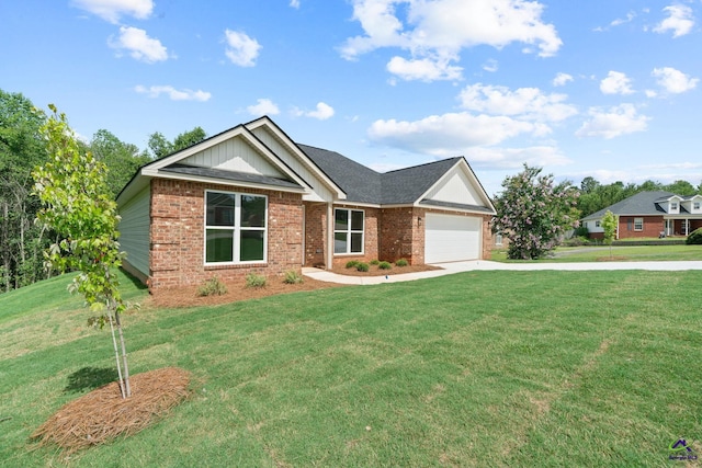 219 Christine Cir, Perry, GA 31069 - view of front facade featuring brick siding, concrete driveway, an attached garage, and a front yard