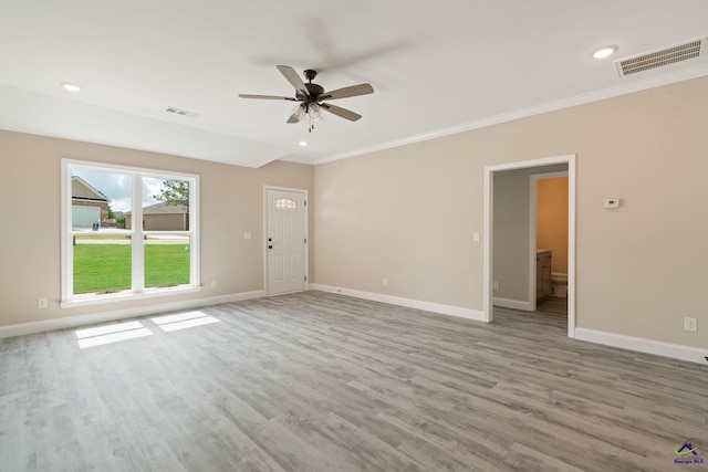 219 Christine Cir, Perry, GA 31069 - unfurnished living room featuring a ceiling fan, crown molding, wood finished floors, and recessed lighting