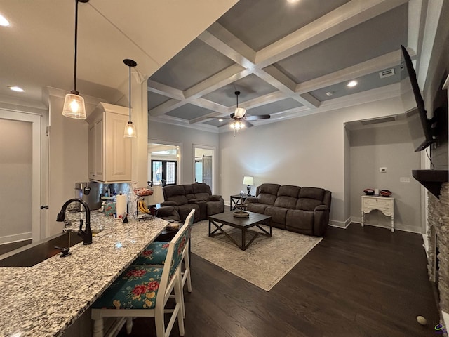 400 Rustic Live Oak Trl, Bonaire, GA 31005 - living room featuring dark wood-style flooring, coffered ceiling, a ceiling fan, recessed lighting, and beamed ceiling