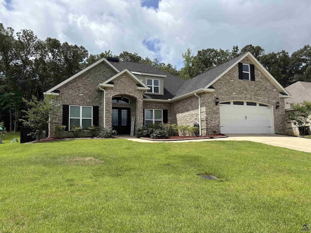 400 Rustic Live Oak Trl, Bonaire, GA 31005 - view of front of home featuring brick siding, a front yard, and concrete driveway