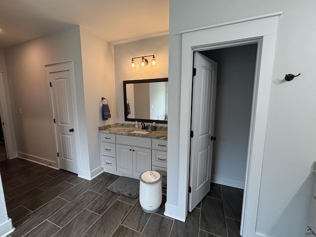 400 Rustic Live Oak Trl, Bonaire, GA 31005 - bathroom featuring vanity and wood finish floors