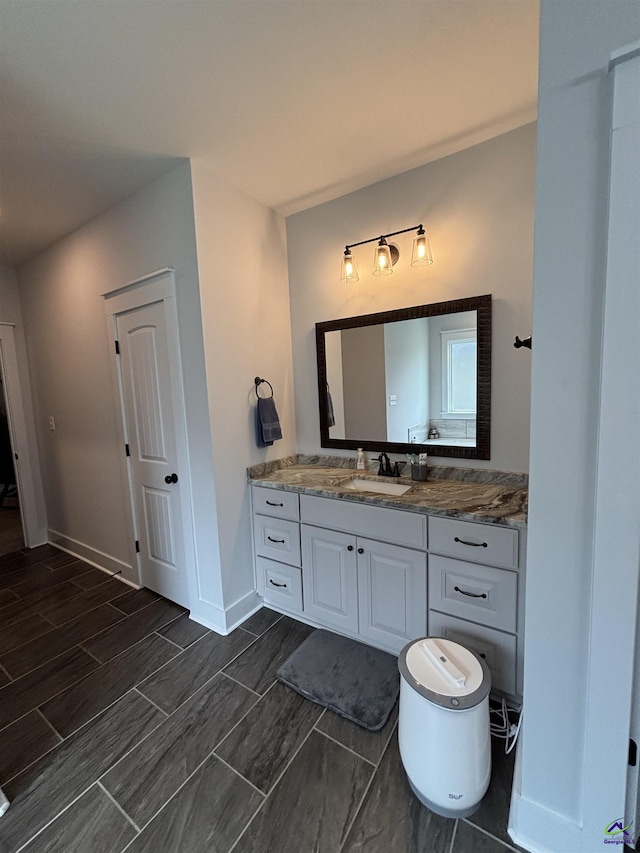 400 Rustic Live Oak Trl, Bonaire, GA 31005 - bathroom featuring vanity and baseboards