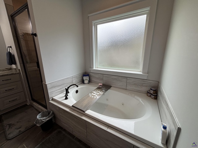 400 Rustic Live Oak Trl, Bonaire, GA 31005 - full bathroom with a shower stall and a whirlpool tub
