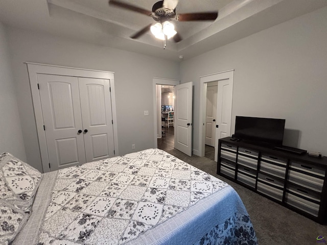 400 Rustic Live Oak Trl, Bonaire, GA 31005 - bedroom with carpet floors, a tray ceiling, and ceiling fan