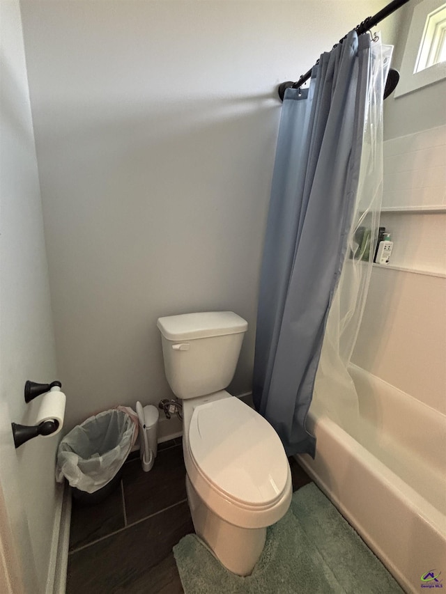 400 Rustic Live Oak Trl, Bonaire, GA 31005 - bathroom featuring toilet and shower / bath combo with shower curtain