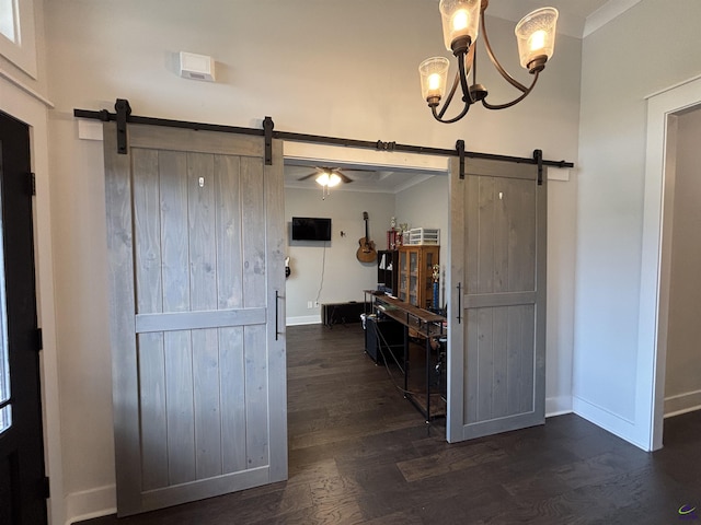 400 Rustic Live Oak Trl, Bonaire, GA 31005 - foyer with a barn door, dark wood-style flooring, crown molding, and a chandelier