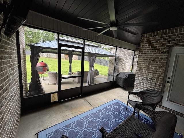 400 Rustic Live Oak Trl, Bonaire, GA 31005 - sunroom with ceiling fan