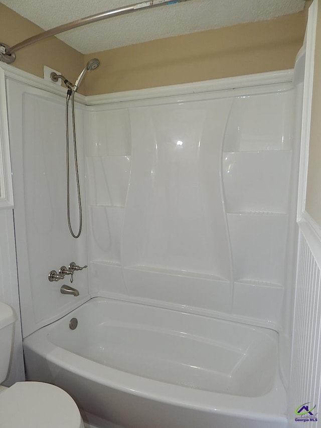 3498 Sandy Cir, Macon, GA 31216 - bathroom featuring toilet and washtub / shower combination