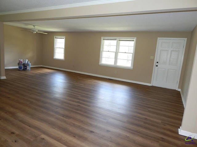 3498 Sandy Cir, Macon, GA 31216 - unfurnished living room with dark wood-style floors, ceiling fan, and crown molding
