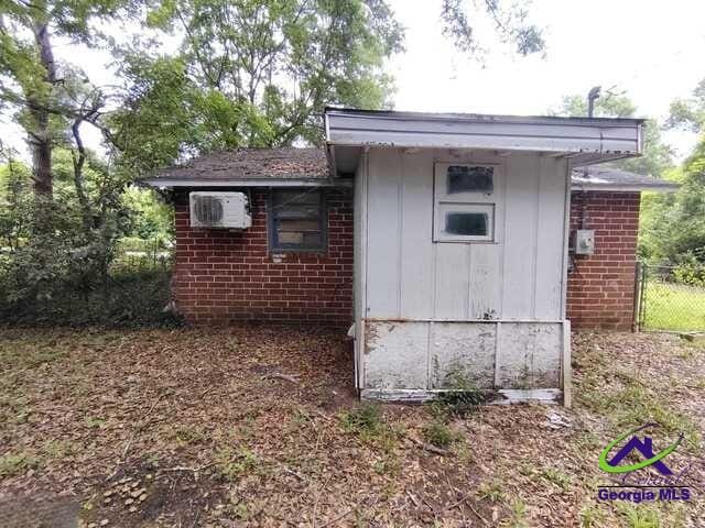 107 Roberts St, Warner Robins, GA 31093 - view of outdoor structure with a wall unit AC
