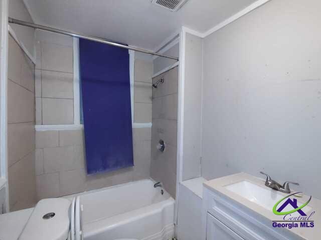 107 Roberts St, Warner Robins, GA 31093 - bathroom with vanity and shower / tub combination