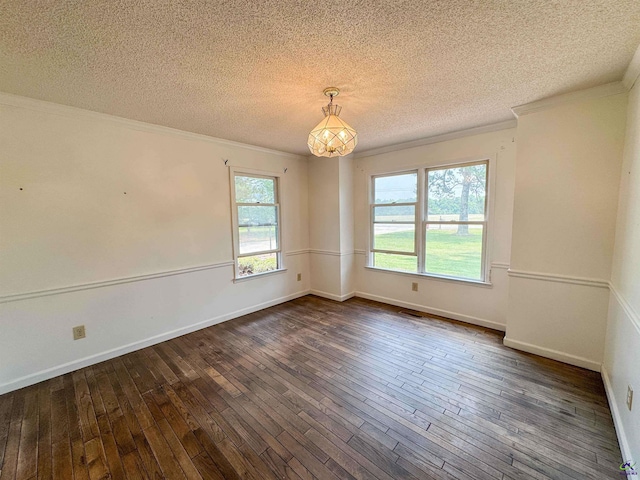 7285 Nowell Rd S, Macon, GA 31216 - spare room with crown molding, a textured ceiling, and dark wood finished floors