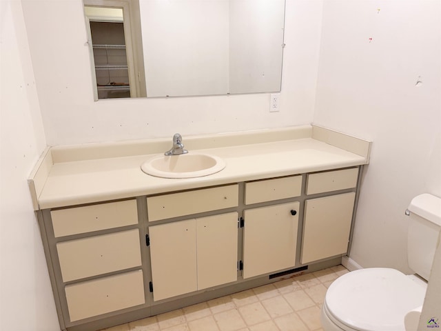 7285 Nowell Rd S, Macon, GA 31216 - half bath with vanity and tile patterned floors