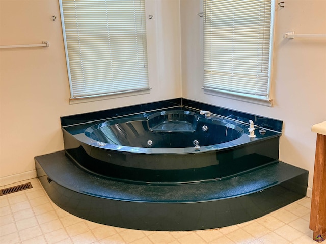 7285 Nowell Rd S, Macon, GA 31216 - full bathroom with a tub with jets