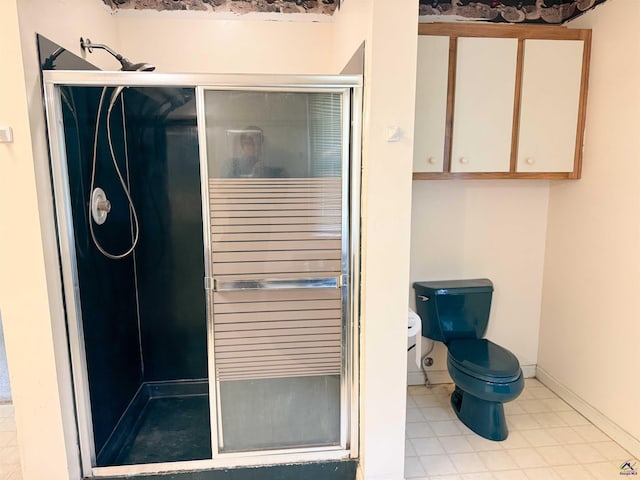 7285 Nowell Rd S, Macon, GA 31216 - bathroom with a shower stall and tile patterned flooring