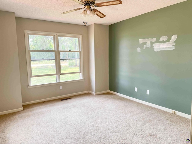 7285 Nowell Rd S, Macon, GA 31216 - carpeted spare room with ceiling fan and a textured ceiling