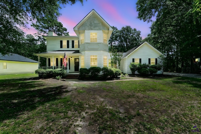 109 S Hiley Ct, Bonaire, GA 31005 - victorian house featuring covered porch, a chimney, and a front lawn