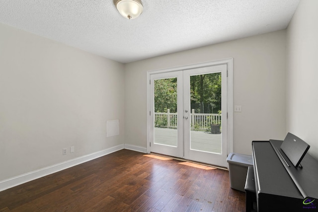 109 S Hiley Ct, Bonaire, GA 31005 - doorway to outside with dark wood-type flooring, french doors, and a textured ceiling