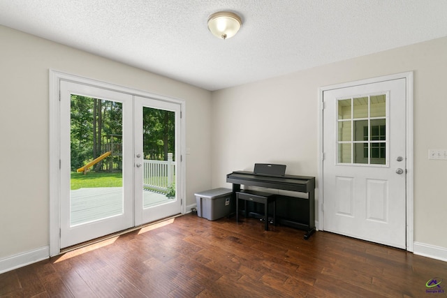 109 S Hiley Ct, Bonaire, GA 31005 - office featuring wood finished floors, a textured ceiling, and french doors
