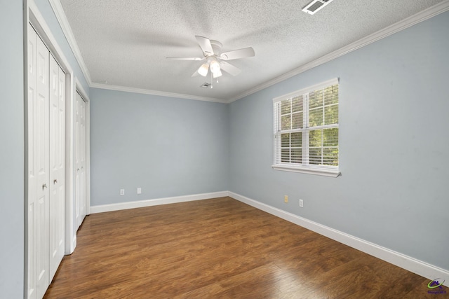 109 S Hiley Ct, Bonaire, GA 31005 - unfurnished bedroom featuring wood finished floors, a textured ceiling, crown molding, a closet, and ceiling fan