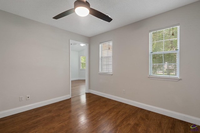 109 S Hiley Ct, Bonaire, GA 31005 - unfurnished room featuring dark wood-style flooring and a ceiling fan