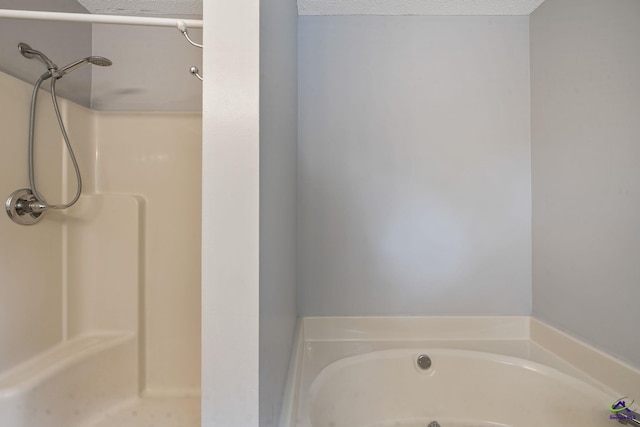 109 S Hiley Ct, Bonaire, GA 31005 - full bathroom with a bath, a shower, and a textured ceiling
