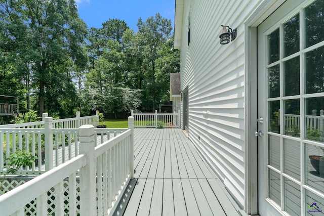 109 S Hiley Ct, Bonaire, GA 31005 - wooden deck with view of scattered trees