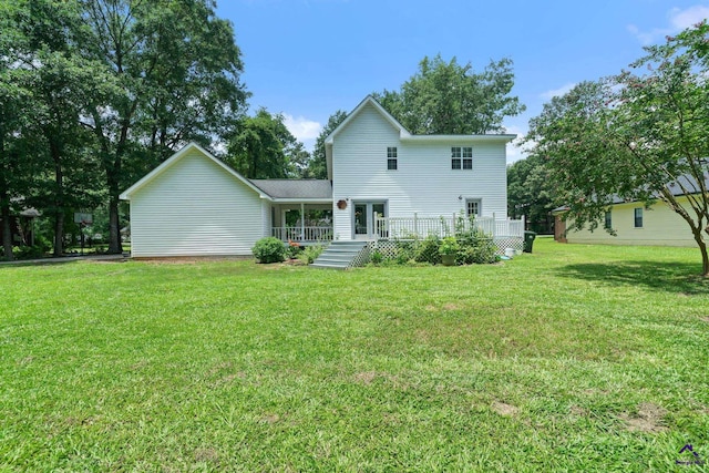 109 S Hiley Ct, Bonaire, GA 31005 - rear view of property featuring a lawn