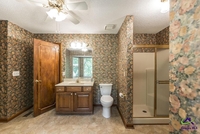 112 Springtime Dr, Warner Robins, GA 31088 - full bath featuring a shower stall, vanity, a textured ceiling, and ceiling fan