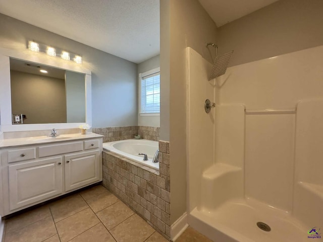 145 Rolling Woods Cir, Warner Robins, GA 31088 - full bath with tile patterned flooring, a bath, vanity, and a shower