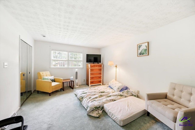 1414 Park Ave, Perry, GA 31069 - carpeted living area featuring a textured ceiling