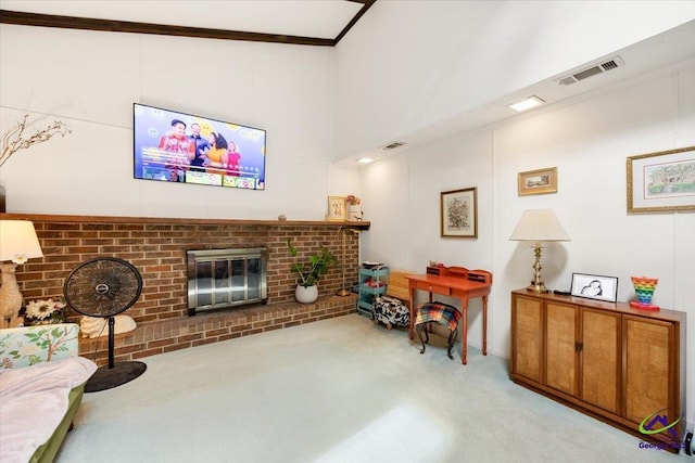 1414 Park Ave, Perry, GA 31069 - carpeted living room featuring a brick fireplace and a towering ceiling