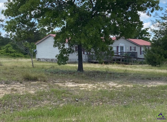 82 Tucker Rd, Lizella, GA 31052 - view of yard featuring a deck