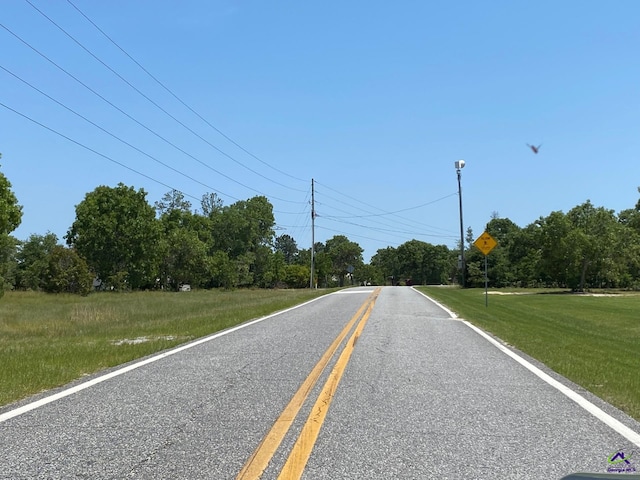 82 Tucker Rd, Lizella, GA 31052 - view of asphalt street with traffic signs