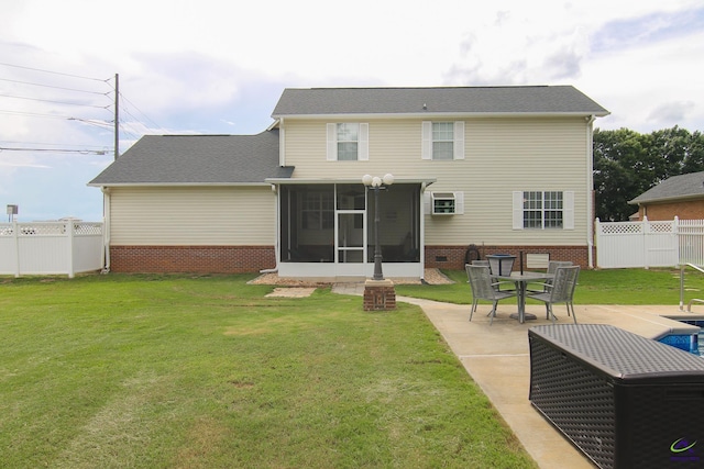 100 Scarlett Dr, Warner Robins, GA 31088 - rear view of property with a sunroom, a fenced backyard, a patio, and brick siding