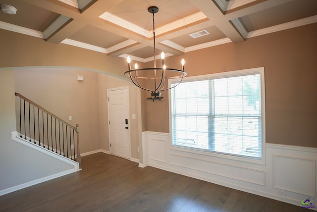 133 W River Cane Run, Perry, GA 31069 - foyer entrance with coffered ceiling, beam ceiling, a chandelier, a wainscoted wall, and arched walkways