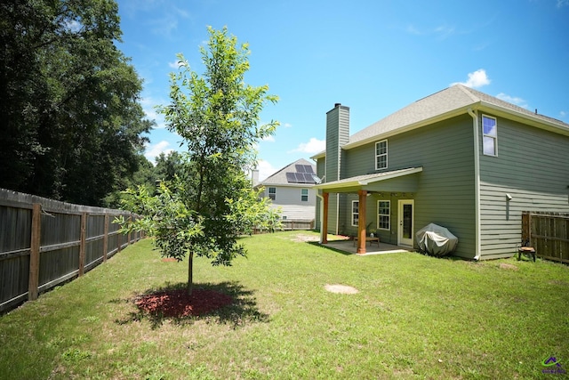 133 W River Cane Run, Perry, GA 31069 - fenced backyard with a patio area