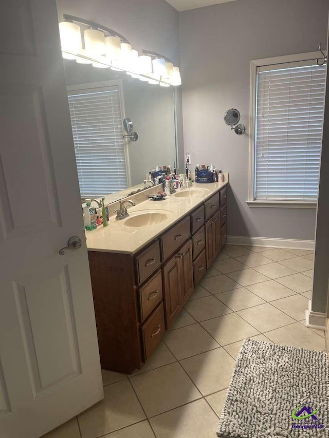 113 Ruzic Dr, Kathleen, GA 31047 - bathroom featuring double vanity and tile patterned floors