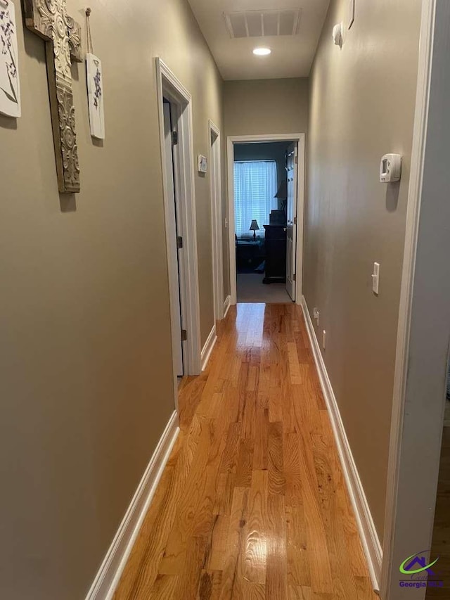 113 Ruzic Dr, Kathleen, GA 31047 - hall featuring light wood-type flooring and baseboards