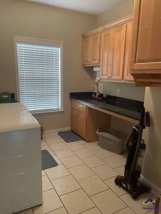 113 Ruzic Dr, Kathleen, GA 31047 - kitchen featuring light tile patterned floors, light brown cabinetry, and dark countertops