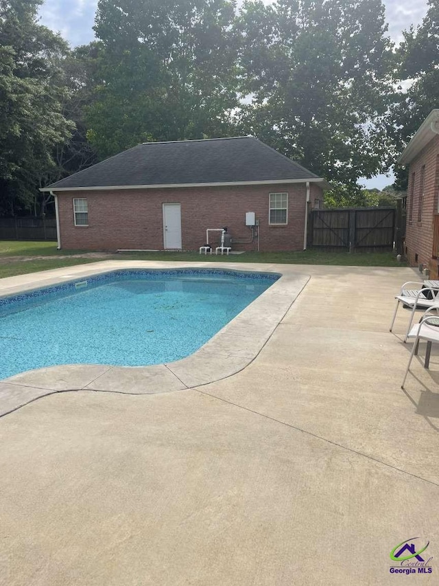113 Ruzic Dr, Kathleen, GA 31047 - view of swimming pool featuring a patio area and view of wooded area