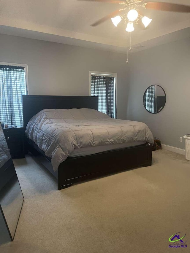 113 Ruzic Dr, Kathleen, GA 31047 - carpeted bedroom featuring baseboards and ceiling fan