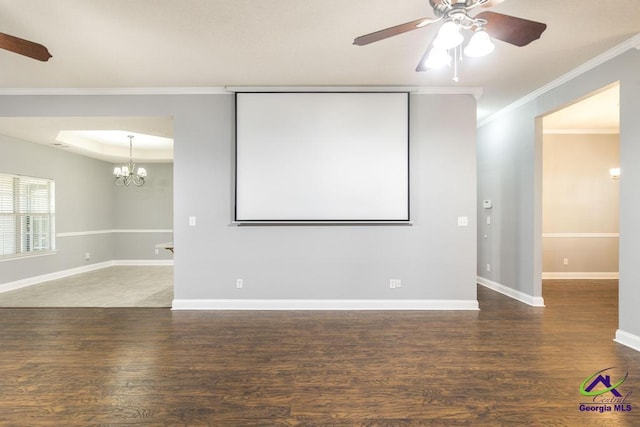 310 Woods Edge Way, Warner Robins, GA 31088 - home theater room with a ceiling fan, wood finished floors, ornamental molding, and a chandelier