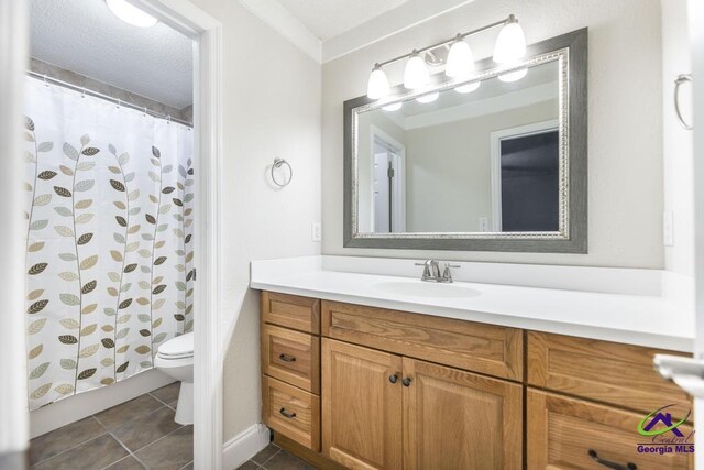 310 Woods Edge Way, Warner Robins, GA 31088 - bathroom with vanity, tile patterned floors, and a shower with shower curtain
