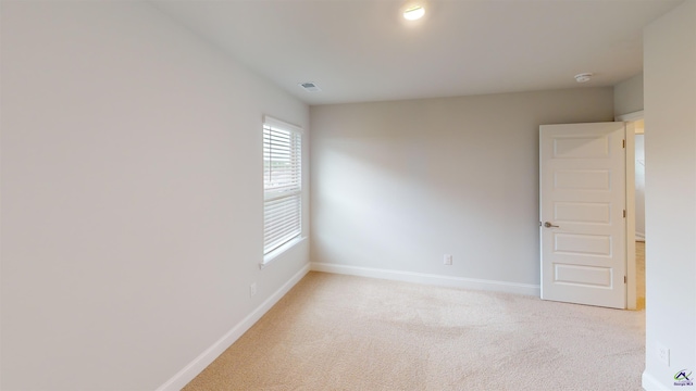 463 Southern Oaks Dr, Macon, GA 31216 - empty room featuring light carpet and a smoke detector